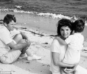 jackie bouvier kennedy with her children and robert kennedy on the beach.jpg
